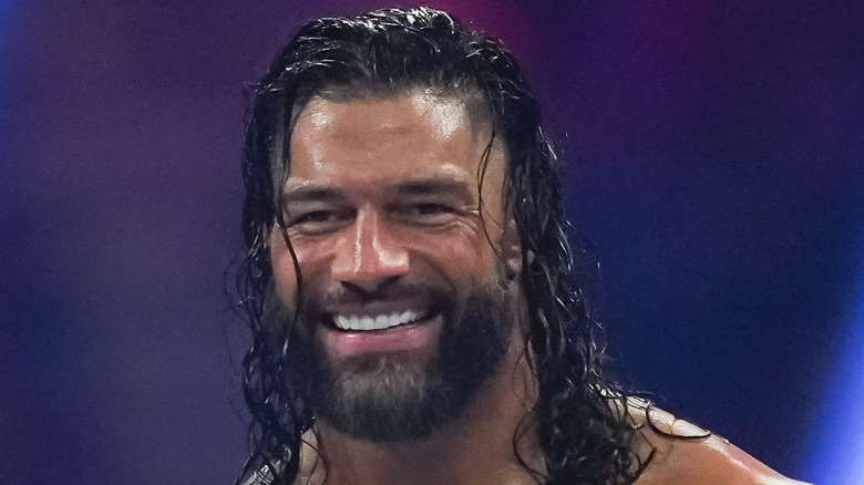 Roman Reigns in the ring smiling