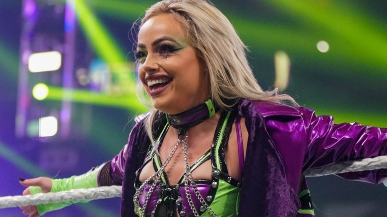 Liv Morgan smiles on the ring ropes