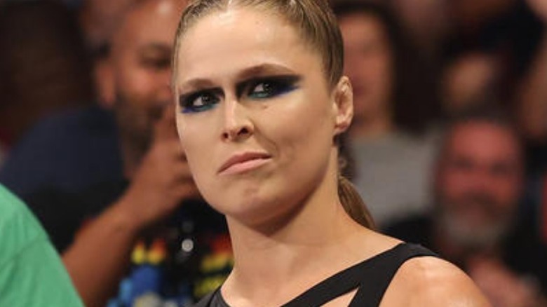 Ronda Rousey smirks at the crowd