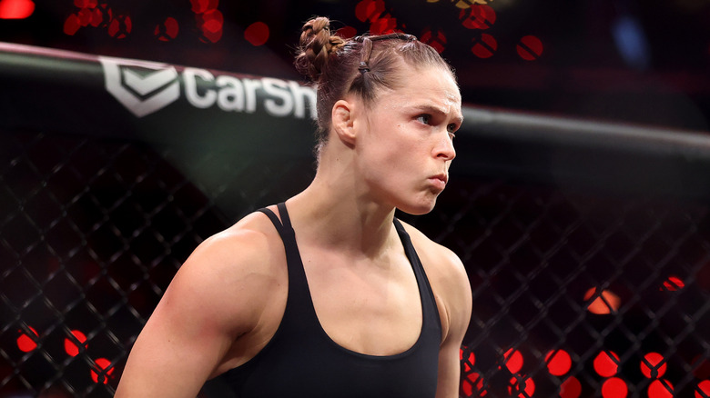 Ronda Rousey looks on before her featherweight bout against Gina Carano during the main card of Netflix's Ronda Rousey vs. Gina Carano at Intuit Dome
