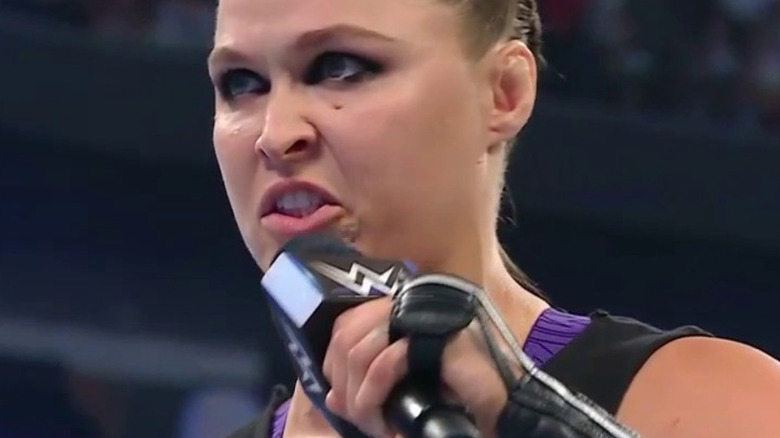Ronda Rousey with a microphone