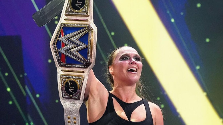 Ronda Rousey celebrates a title win