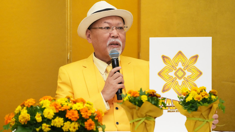 Dream Star Fighting Marigold owner, Rossy Ogawa, discusses his new promotion at a press event