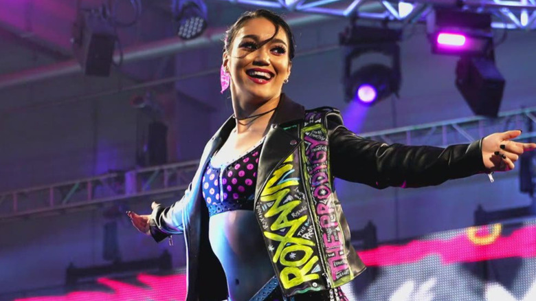 Roxanne Perez standing on the turnbuckle