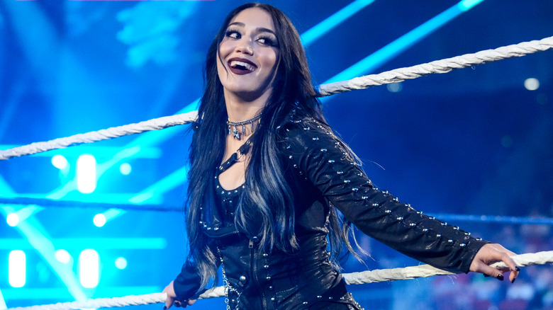 Roxanne Perez is wearing a black jacket
