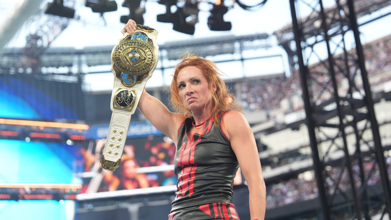 Becky Lynch celebrating her SummerSlam win
