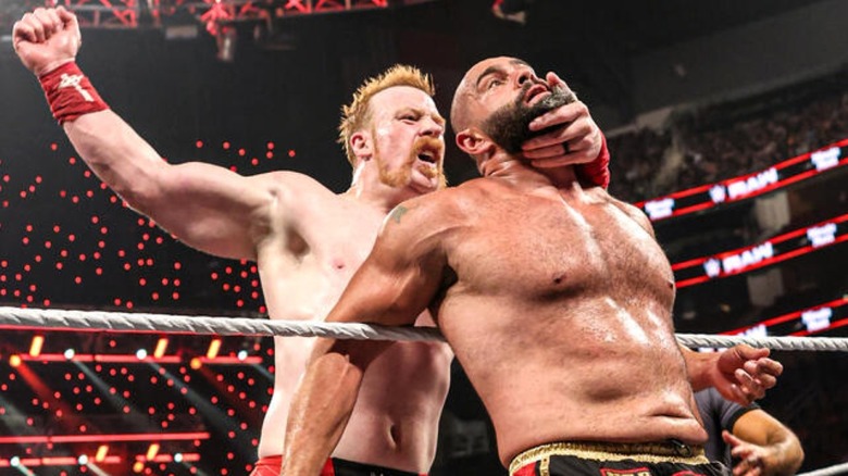 Sheamus hits Rusev against the ropes