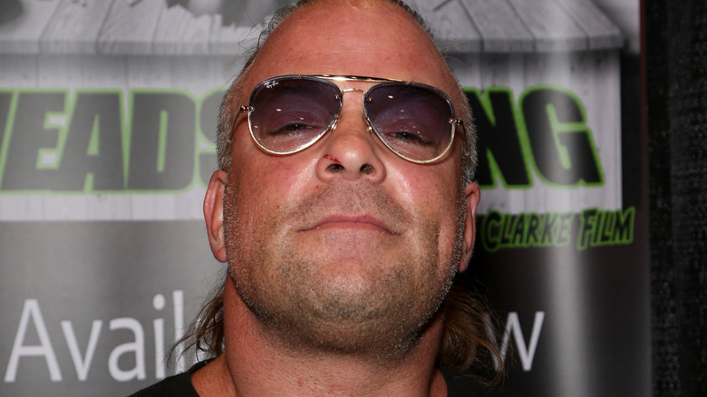 Close-up of Rob Van Dam wearing sunglasses
