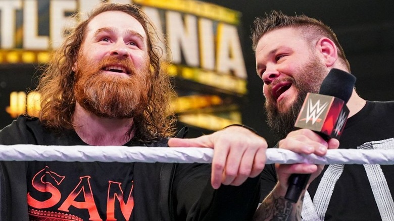 Kevin Owens and Sami Zayn smiling