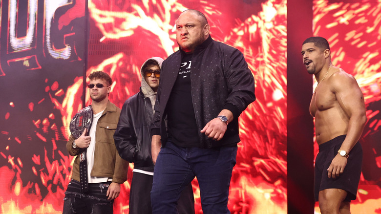 Samoa Joe, flanked by The Opps, returns to AEW All Out 2026 to answer 
