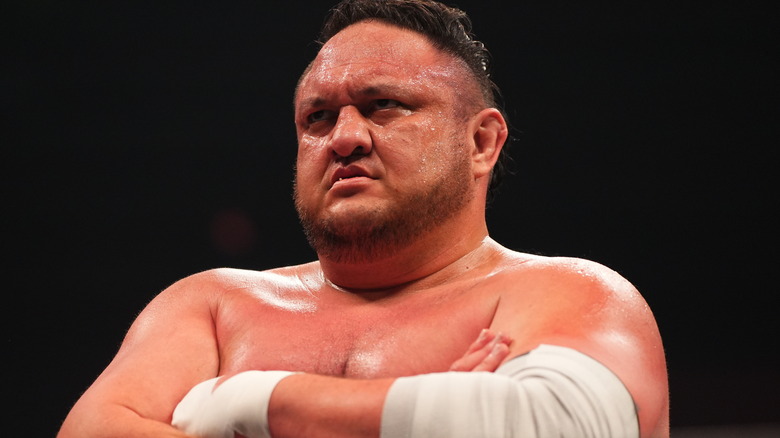 Samoa Joe folding his arms