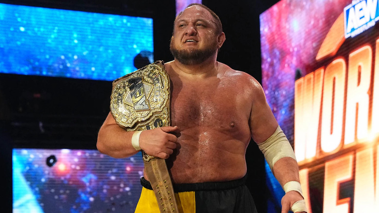Samoa Joe shows off the gold