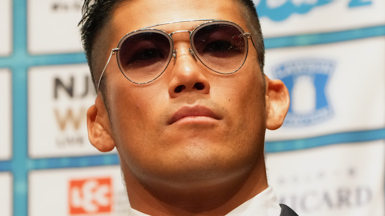SANADA with sunglasses at an NJPW press conference ahead of Sakura Genesis 2023