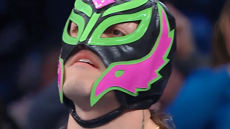 Dominik wearing a Rey Mysterio mask