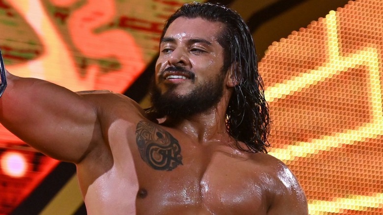Santos Escobar smirking