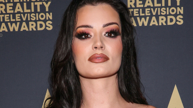 saraya posing on red carpet