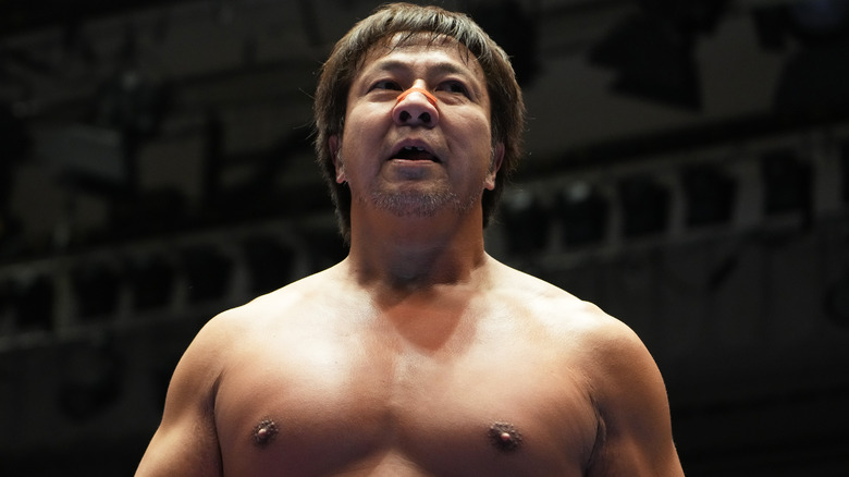 Satoshi Kojima posing