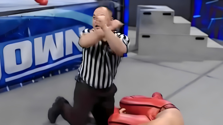 A referee gives the dreaded X sign