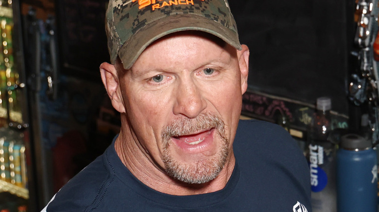 WWE legend "Stone Cold" Steve Austin bartending in 2023