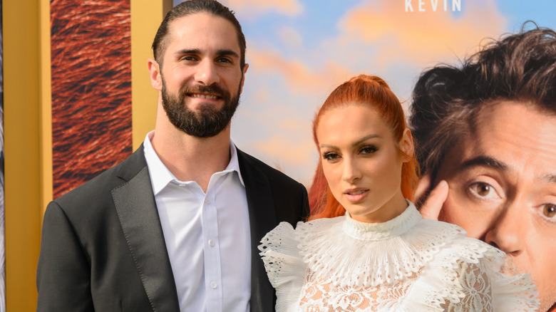 Seth Rollins and Becky Lynch standing beside one another