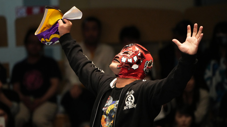 NJPW Star BUSHI Poses During His Entrance