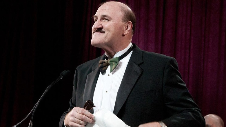 Sgt. Slaughter In a suit and bowtie smiling