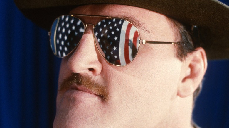 The American flag reflects in the sunglasses of Sgt. Slaughter.