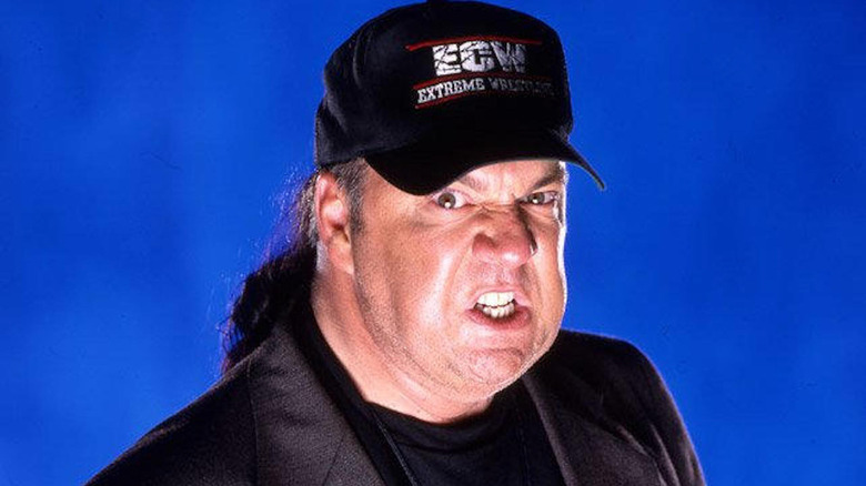 Paul Heyman grimaces fiercely
