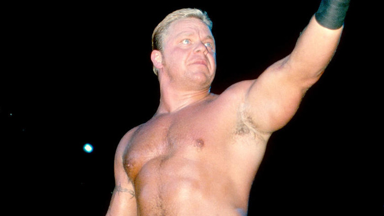 Shane Douglas raising his left arm