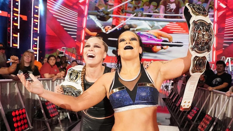Ronda Rousey and Shayna Baszler celebrating