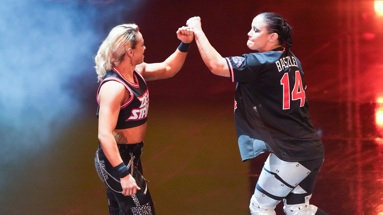 Zoey Stark and Shayna Baszler fist bump