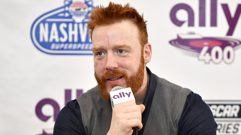 Sheamus speaking into a mic