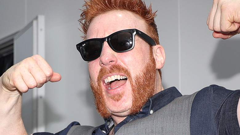 Sheamus flexing muscles