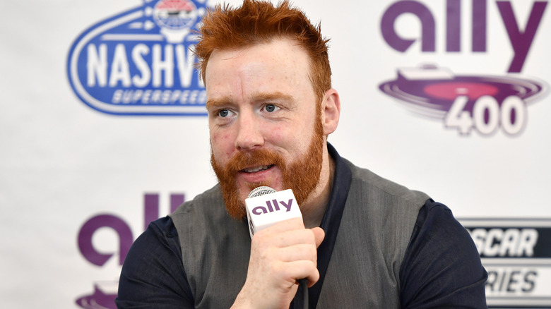 Sheamus holding a microphone