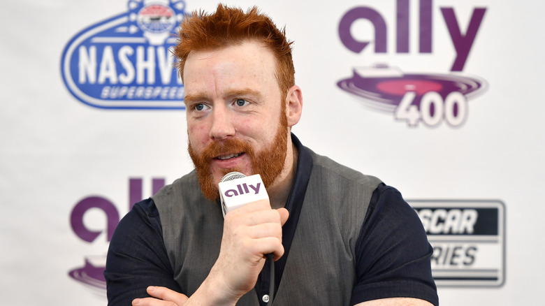 Sheamus speaking at an Ally Racing Team event