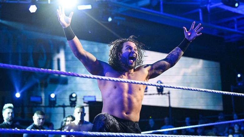 Shiloh Hills poses in the ring and looks to the crowd before a match on 