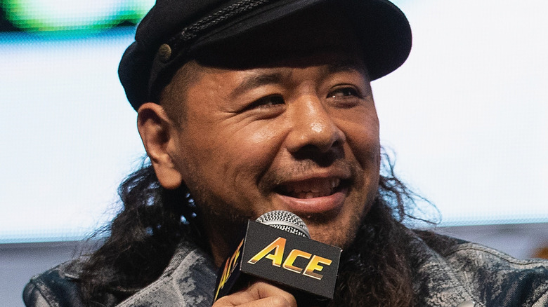 Shinsuke Nakamura holding microphone
