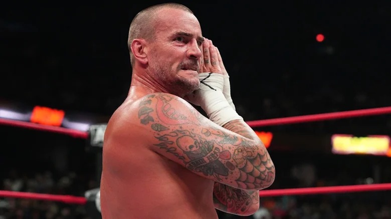 CM Punk signals for the GTS