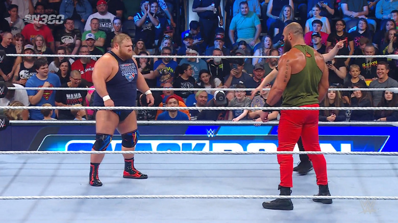 Otis and Strowman facing off in the ring