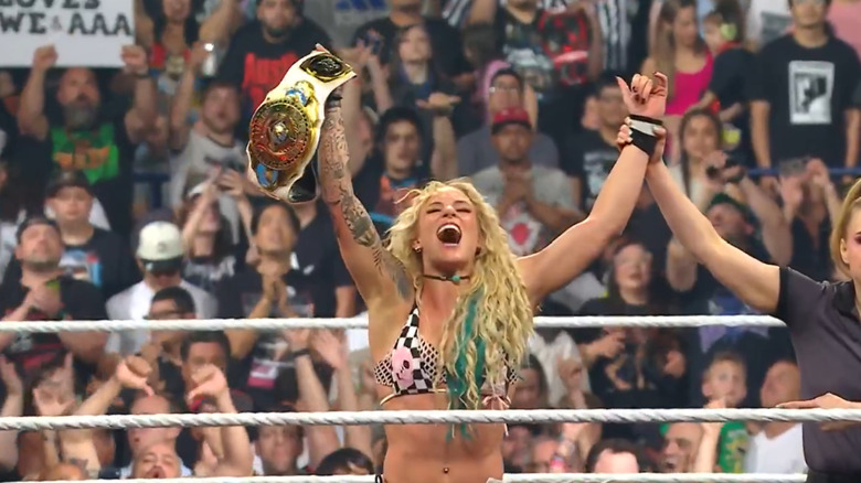 Sol Ruca celebrates with the Women's Intercontinental Championship