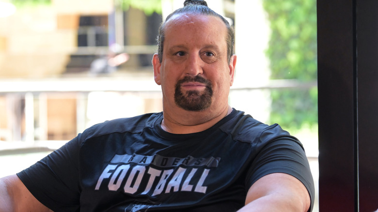 Tommy Dreamer is wearing a black t-shirt