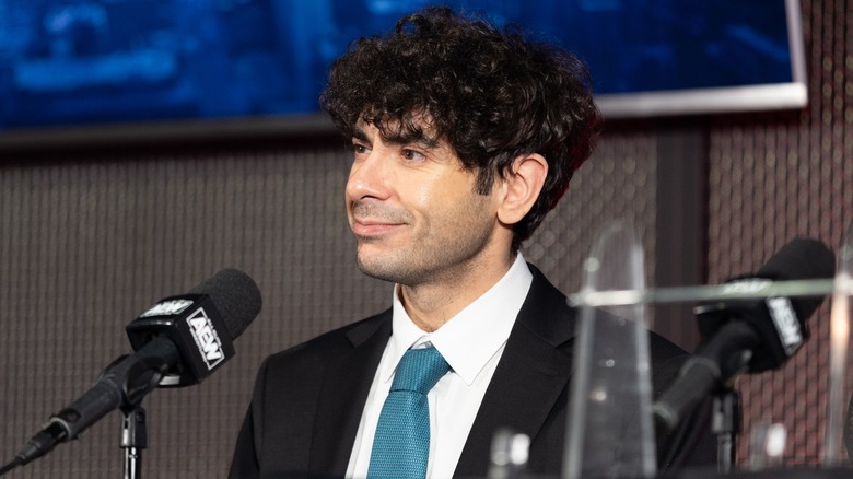 Tony Khan Looks On During An AEW Media Scrum