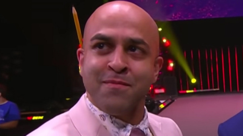 Sonjay Dutt smiling pencil ear