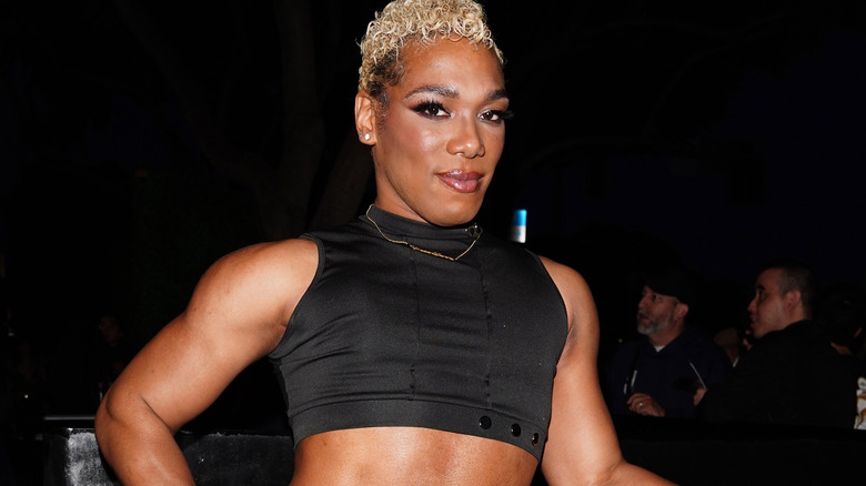 Sonny Kiss wearing a black crop top