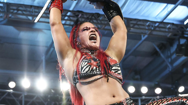 Zaria holding up the NXT Women's North American Championship