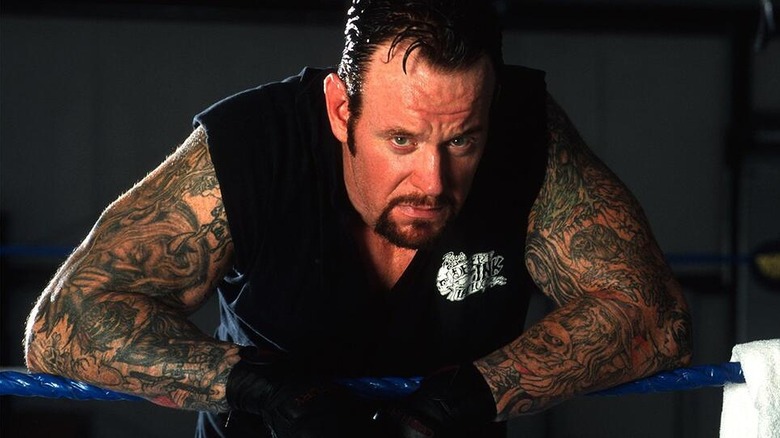 The Undertaker during a backstage photoshoot during his earlier career within WWE.