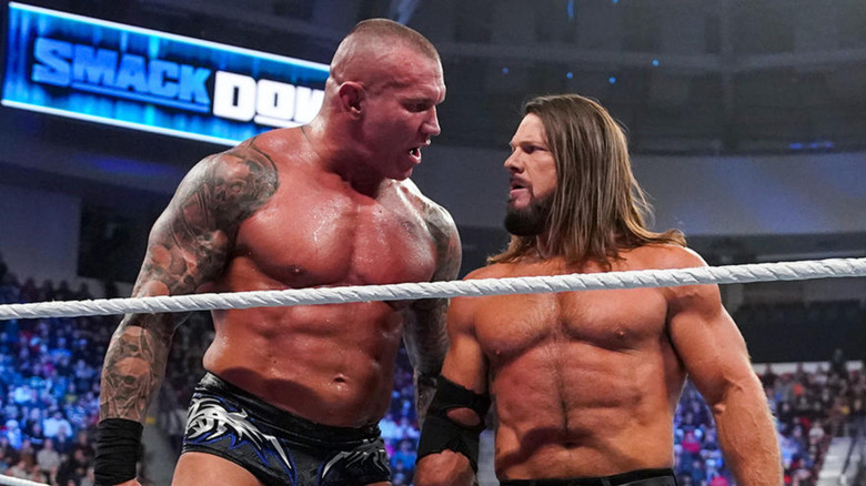 Randy Orton and AJ Styles staring at each other