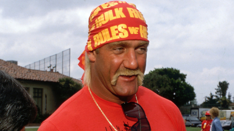 Hulk Hogan wearing a red bandana that says Hulk Rules