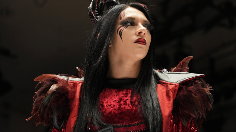 Stephanie Vaquer looks on defiantly in a set of red gear.