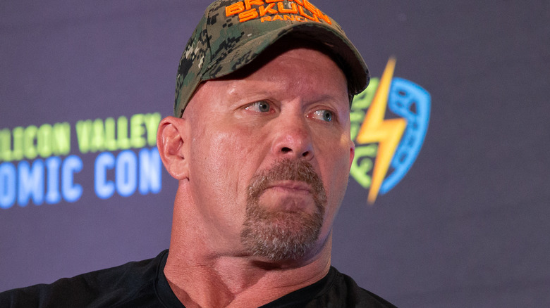 Steve Austin wearing a baseball cap